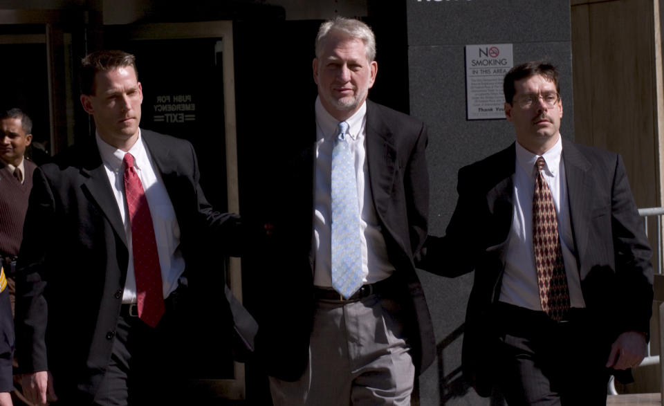 Bernie Ebbers, Worldcom CEO, under arrest and being escorted by FBI agents to court (RJ Capak/WireImage)