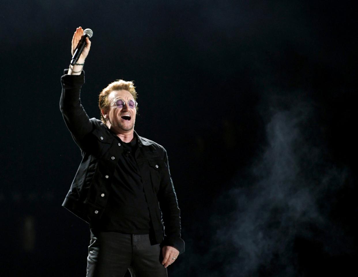 U2's Bono performs on the What Stage as the headlining performance at Bonnaroo in Manchester, Tenn., on June 9, 2017.