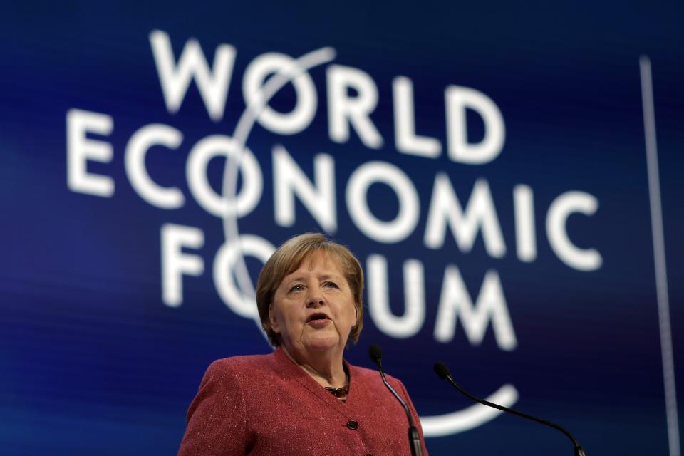 German Chancellor Angela Merkel addresses at the World Economic Forum in Davos, Switzerland, Thursday, Jan. 23, 2020. The 50th annual meeting of the forum is taking place in Davos from Jan. 21 until Jan. 24, 2020. (AP Photo/Markus Schreiber)