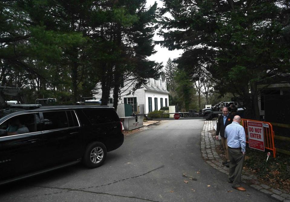 Security personnel take up positions outside the road accessing US President Joe Bidens home in Wilmington, Delaware, on January 29, 2023.