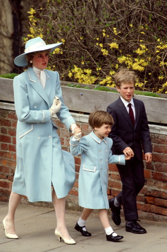 easter outfit fashion style, WINDSOR, UNITED KINGDOM - APRIL 19:  Diana, Princess Of Wales, With Her Son, Prince William And Her Nephew, Peter Phillips, On Their Way To Easter Service.  The Princess Is Wearing A Pale Blue Coat Designed By Catherine Walker Who Made A Similar One For Prince William  (Photo by Tim Graham Photo Library via Getty Images)
