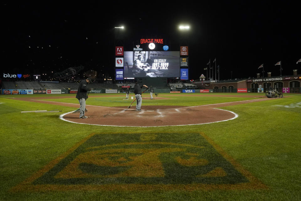 The scoreboard at Oracle Park shows a message for broadcaster Vin Scully after the Los Angeles Dodgers defeated the San Francisco Giants in a baseball game in San Francisco, Tuesday, Aug. 2, 2022. (AP Photo/Jeff Chiu)