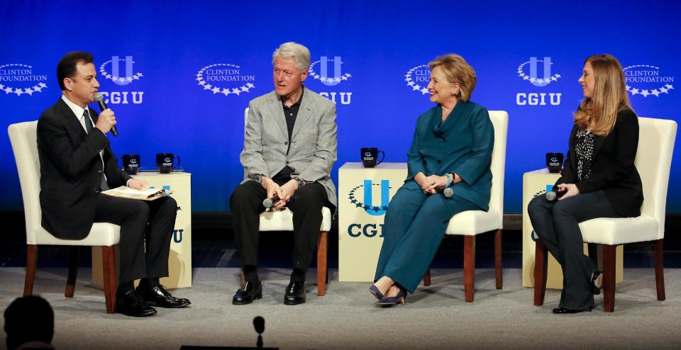 Talk show host Jimmy Kimmel, from left, former President Bill Clinton former Secretary of State Hillary Rodham Clinton and Vice Chair of the Clinton Foundation, Chelsea Clinton speak during a student conference for the Clinton Global Initiative University, Saturday, March 22, 2014, at Arizona State University in Tempe, Ariz. More than 1,000 college students are gathered at Arizona State University this weekend as part of the Clinton Global Initiative University's efforts to advance solutions to pressing world challenges. (AP Photo/Matt York)