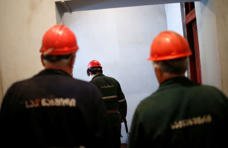 Miners enter the Mindeli coal mine in Tkibuli, Georgia, July 13, 2018. REUTERS/David Mdzinarishvili