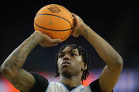 North Carolina guard Caleb Love shoots during practice for the men's Final Four NCAA college basketball tournament, Friday, April 1, 2022, in New Orleans. (AP Photo/David J. Phillip)