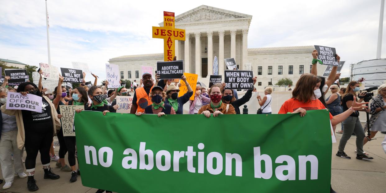 Abortion-rights groups and anti-abortion rights groups protest outside Supreme Court