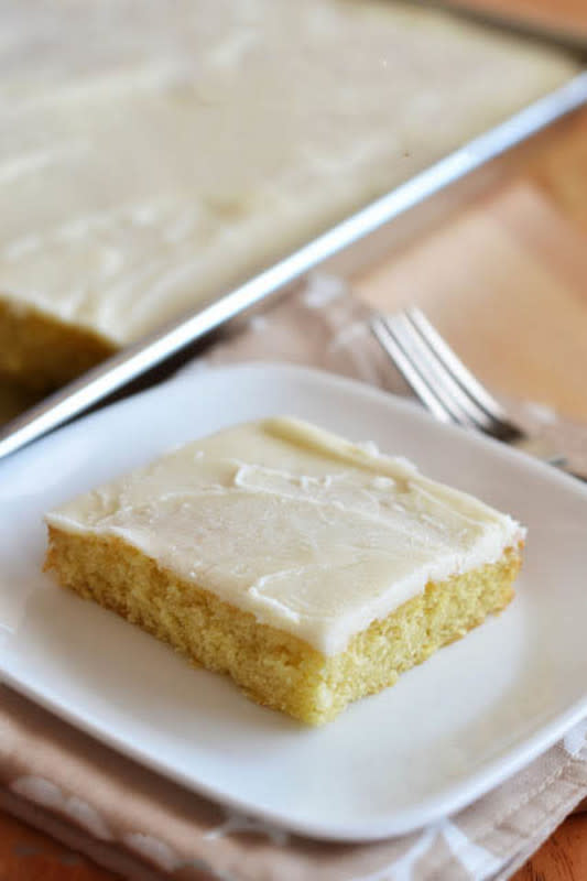 <p>Life in the Lofthouse</p><p><strong>White Texas Sheet Cake </strong>is an almond-scented twist on classic Texas sheet cake that can feed a crowd. This delicious dessert is perfect to make for holidays and parties!</p><p><strong>Get the recipe: </strong><a href="https://life-in-the-lofthouse.com/white-texas-sheet-cake/" rel="nofollow noopener" target="_blank" data-ylk="slk:White Chocolate Sheet Cake;elm:context_link;itc:0;sec:content-canvas" class="link rapid-noclick-resp"><strong>White Chocolate Sheet Cake</strong></a></p>