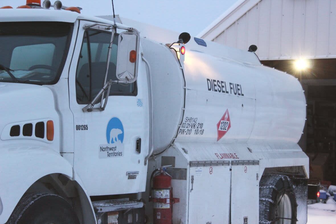 A diesel truck in Fort Good Hope, N.W.T. in January 2023. A recent energy initiatives report says N.W.T. residents, businesses, communities and government offset 8.4 million litres of diesel in 2023 — which amounts to more than $12 million in savings. (Liny Lamberink/CBC - image credit)