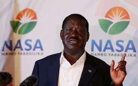 Kenyan opposition leader Raila Odinga addresseds a news conference - Credit:  REUTERS