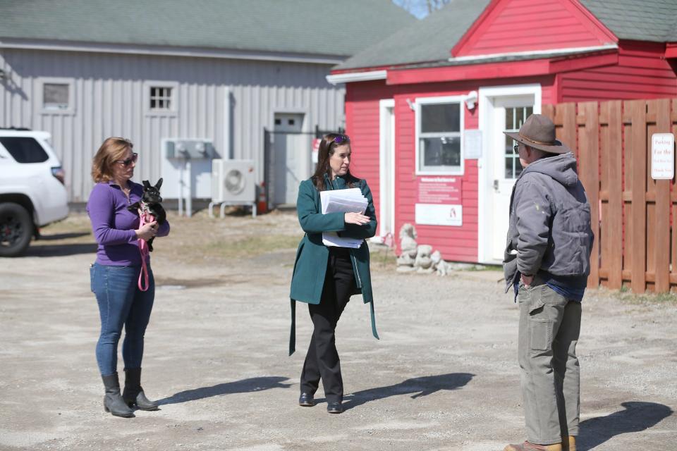 The Site Plan Review Board conducted a site walk of the Red Barn Inn on March 13. Owner Audra Simpson is at left, her lawyer Kristin Collins, center and Gary Dugas of the board discuss the rules of the event.