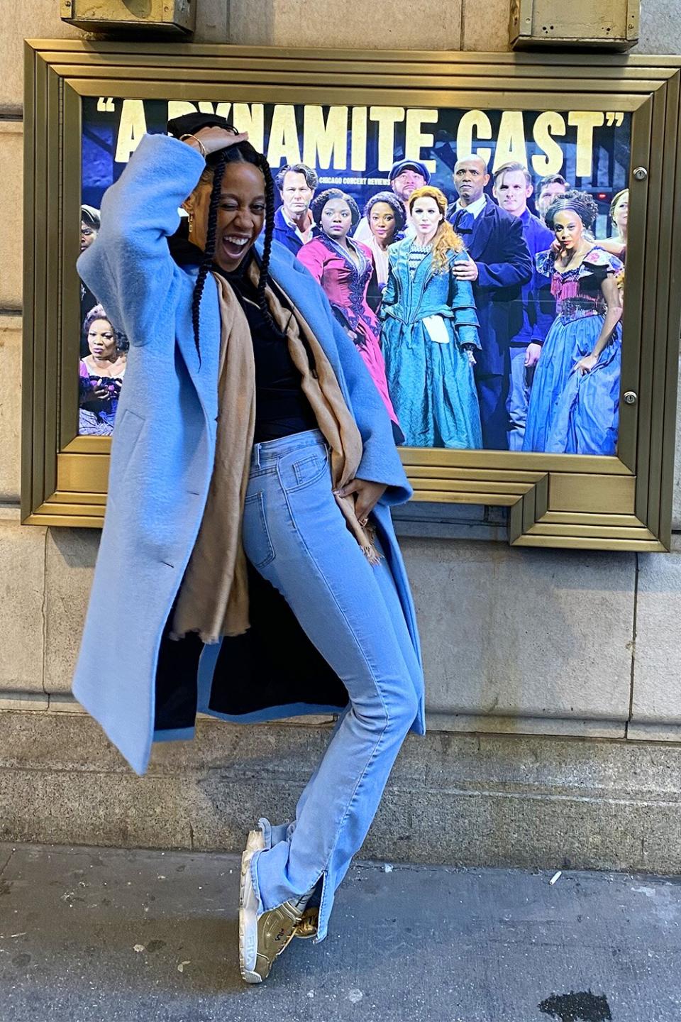 Hailee Kaleem Wright in front of the Paradise Square Marquee