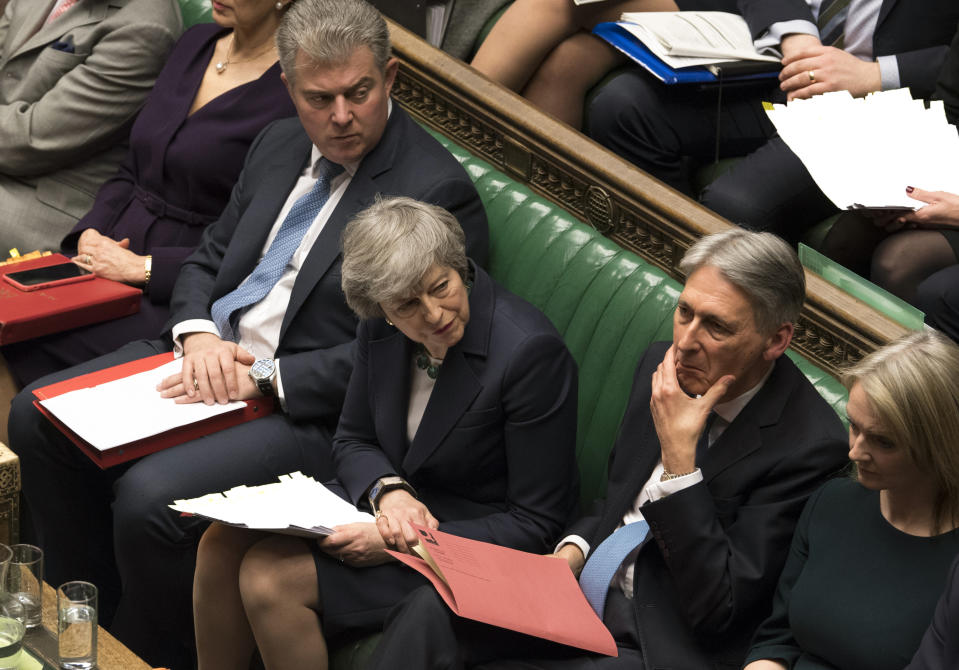 Britain's Prime Minister Theresa May in the House of Commons, London, Wednesday March 13, 2019. Political crisis in Britain is sparking anxiety across the European Union, as fears rise that Britain will crash out of the bloc on March 29 without a withdrawal agreement to smooth the way. (Mark Duffy/UK Parliament via AP)