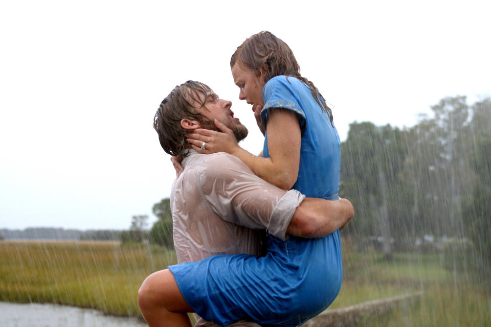 Noah and Allie hugging and about to kiss in the rain