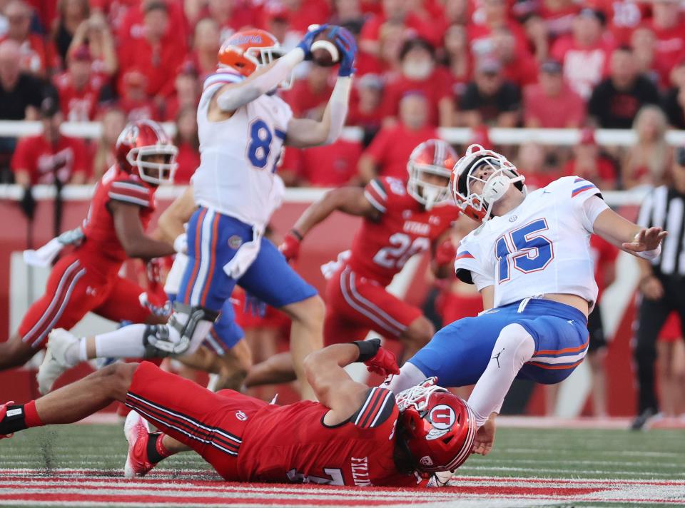 Utah Utes defensive end Van Fillinger (7) hurries Florida Gators quarterback Graham Mertz (15) in Salt Lake City on Thursday, Aug. 31, 2023 during the season opener. | Jeffrey D. Allred, Deseret News