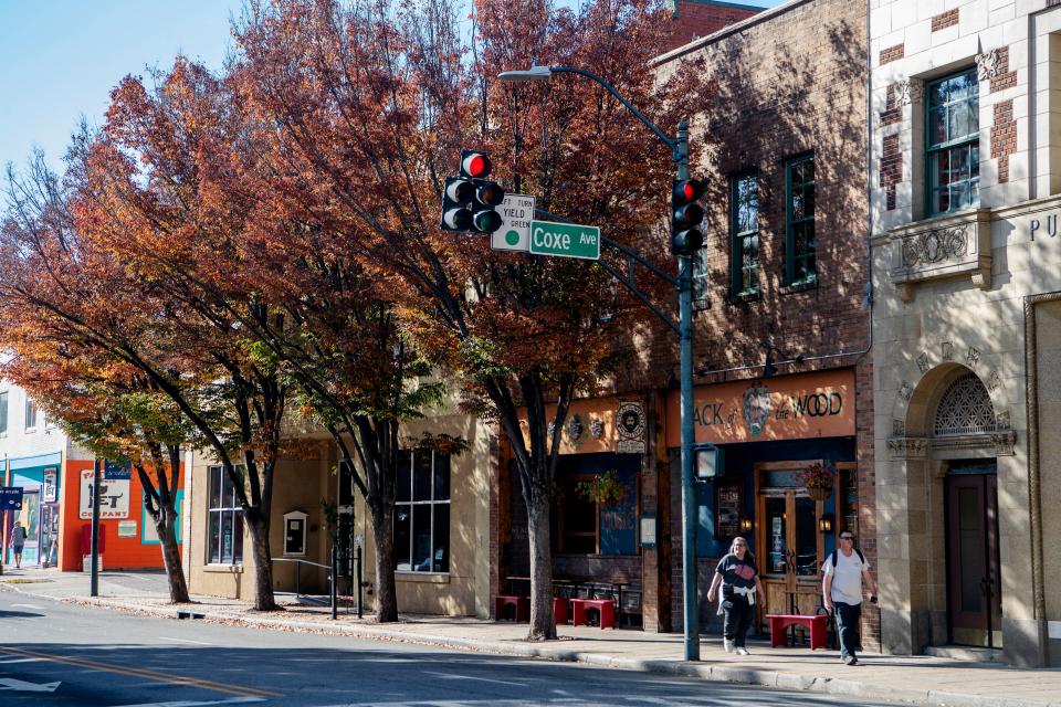 The city of Asheville is currently working on a sidewalk accessibility project on Patton Avenue between Coxe and Asheland avenues. The project is expected to be finished by September and the trees seen above have been removed since construction began.