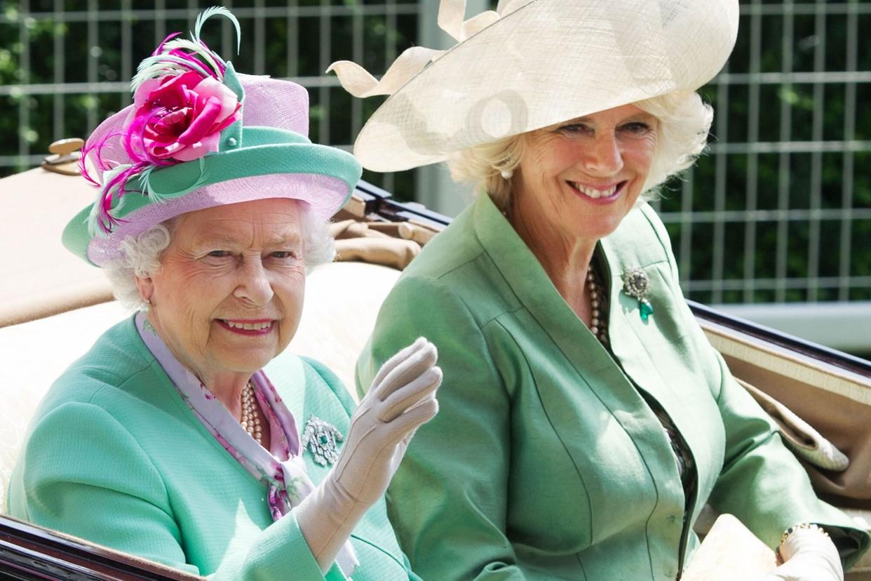 ASCOT, UNITED KINGDOM - JUNE 19: Queen Elizabeth II and Camilla, Duchess of Cornwall arrive by carriage on day 2 of Royal Ascot at Ascot Racecourse on June 19, 2013 in Ascot, England. (Photo by Samir Hussein/WireImage)