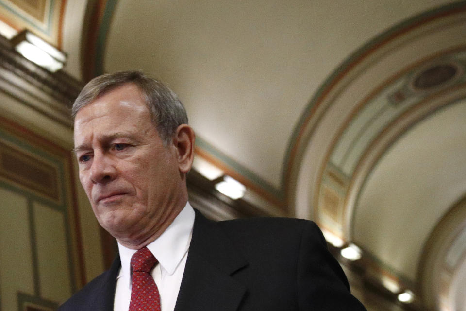 FILE - In this Jan. 29, 2020, file photo Chief Justice of the United States John Roberts departs at the end of the day in the impeachment trial of President Donald Trump on charges of abuse of power and obstruction of Congress on Capitol Hill in Washington. (AP Photo/Patrick Semansky, File)