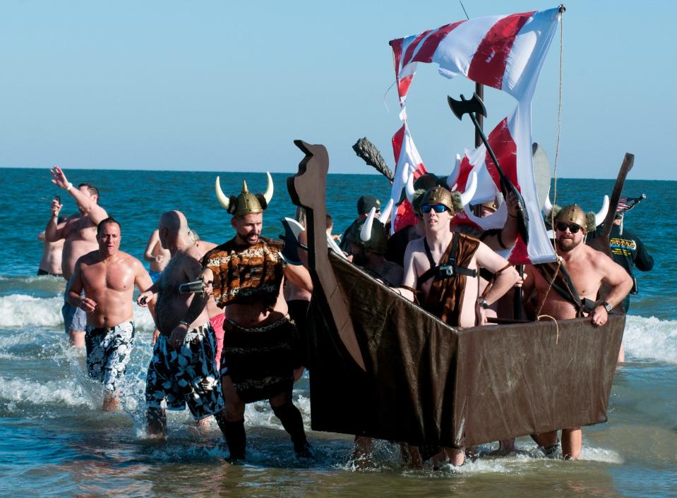 The Bull on the Beach team emerges from the ocean after the 2014 Penguin Swim. The restaurant’s team has raised more than $350,000 for Atlantic General Hospital over the years.