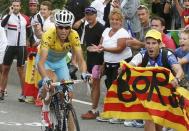 Race leader Astana team rider Vincenzo Nibali of Italy climbs to Hautacam to win the 145.5km 18th stage of the Tour de France cycling race between Pau and Hautacam in the French Pyrenees mountains, July 24, 2014. REUTERS/Jacky Naegelen