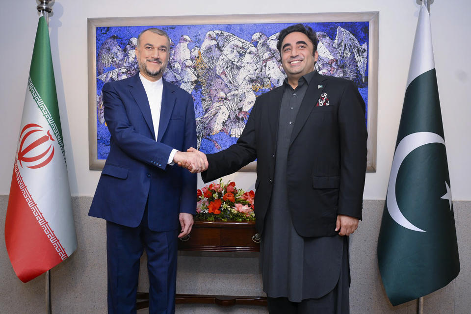 In this photo released by Pakistan's Ministry of Foreign Affairs, visiting Iranian Foreign Minister Hossein Amirabdollahian, left, shakes hand with his Pakistani counterpart Bilawal Bhutto Zardari prior to their meeting, in Islamabad, Pakistan, Thursday, Aug. 3, 2023. Amirabdollahian is in Islamabad for two-day visit to discuss with Pakistani top officials a range of issues, including the completion of the gas pipeline project, improving trade and economic ties between the two sides and ensuring security at a long border which the two nations share in the South Asian region. (Pakistan Ministry of Foreign Affairs via AP)