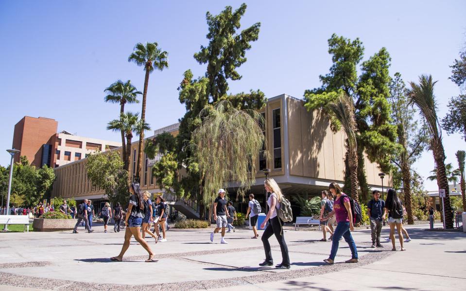 Arizona State University students walk the Tempe campus. ASU and Arizona's other two public universities, the University of Arizona and Nothern Arizona University, have been pushing for the state to increase financial support for Arizona students to cover half of the cost to educate them.