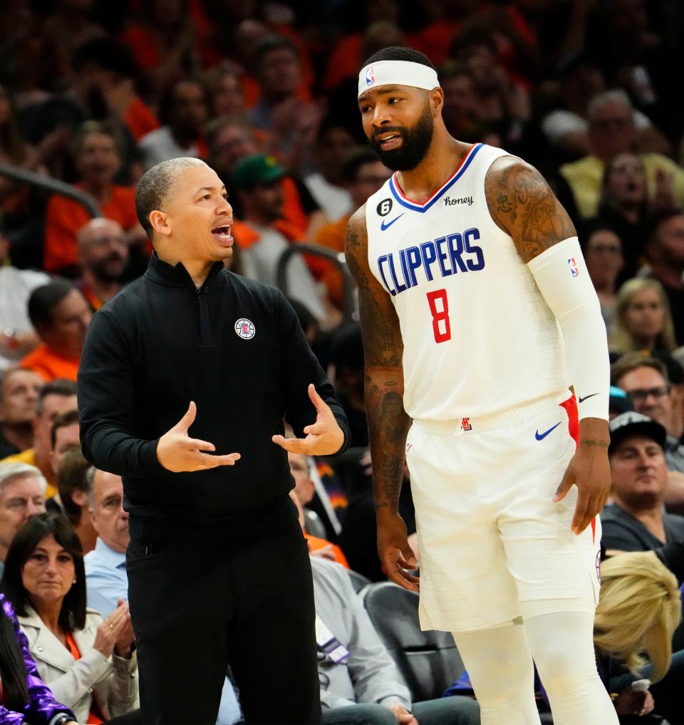 Apr 25, 2023; Phoenix, AZ, USA; LA Clippers head coach Tyronn Lue talks to forward Marcus Morris Sr. (8) against the Phoenix Suns in the first half at Footprint Center. Mandatory Credit: Rob Schumacher-Arizona Republic