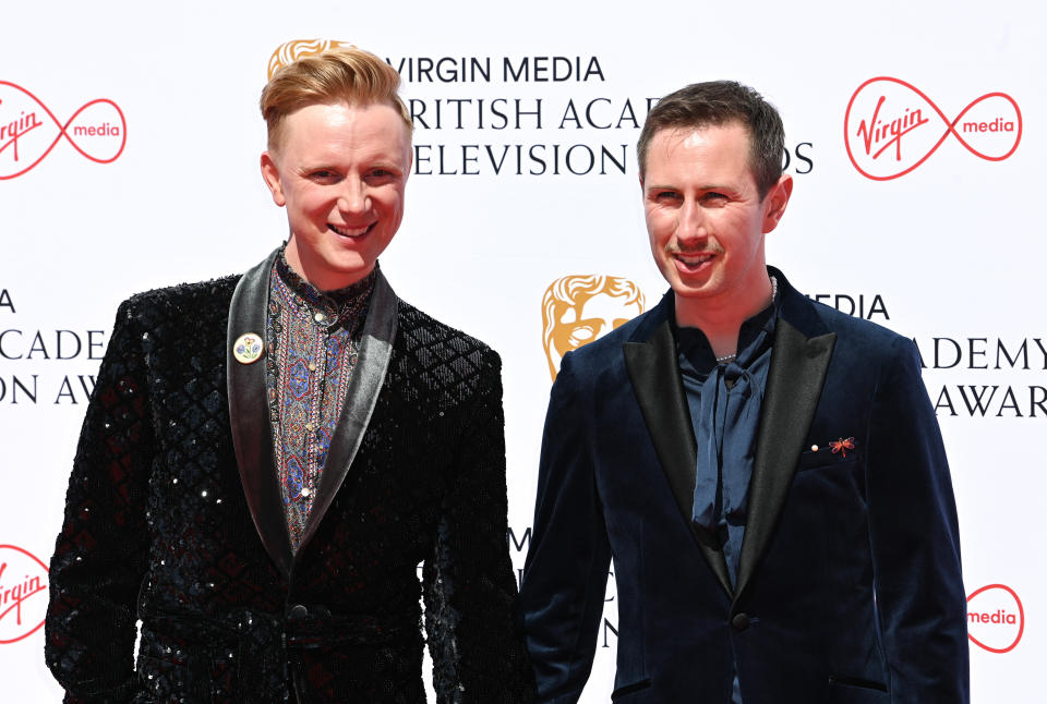 Owain Wyn Evans and husband Arran Rees attending the Virgin Media British Academy Television Awards 2022, Royal Festival Hall, London. Credit: Doug Peters/EMPICS