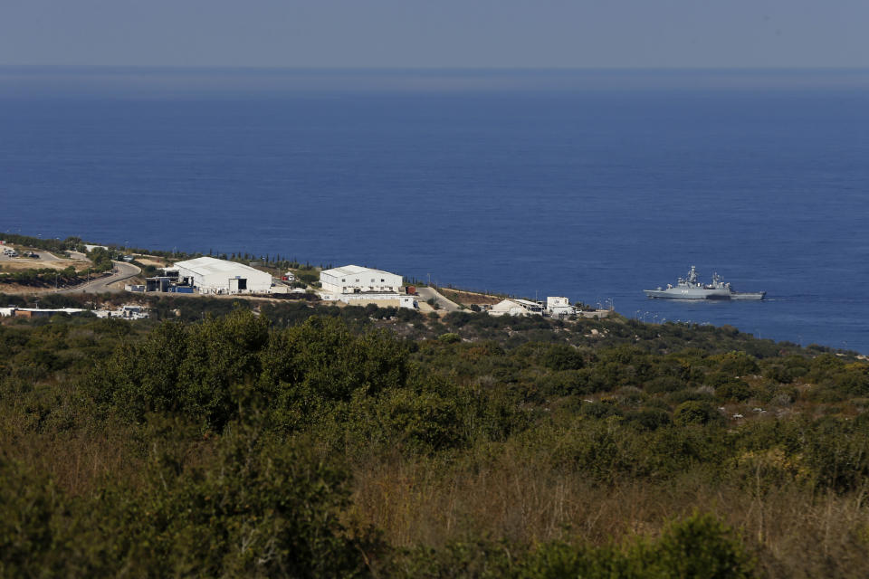 A UNIFIL Navy ship patrols in the Mediterranean Sea next to a base of the U.N. peacekeeping force, off the southern town of Naqoura, Lebanon, Wednesday, Oct. 14, 2020. Lebanon and Israel are to begin indirect talks Wednesday over their disputed maritime border, with American officials mediating the talks that both sides insist are purely technical and not a sign of any normalization of ties. (AP Photo/Bilal Hussein)