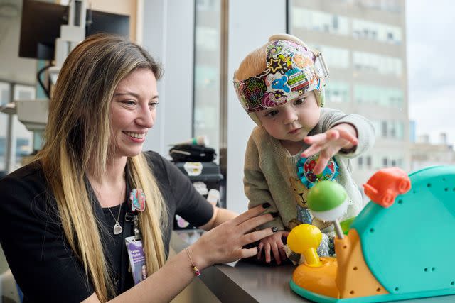 <p> Joe Carrotta / Hassenfeld Children's Hospital at NYU Langone </p> A child life specialist plays with Nathaniel at Hassenfeld Children's Hospital at NYU Langone.