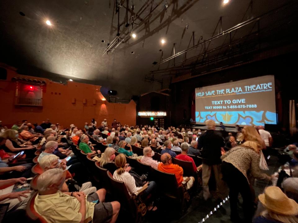 Audience members gather for a fundraiser at the historic Plaza Theatre on Saturday, March 19, 2022.