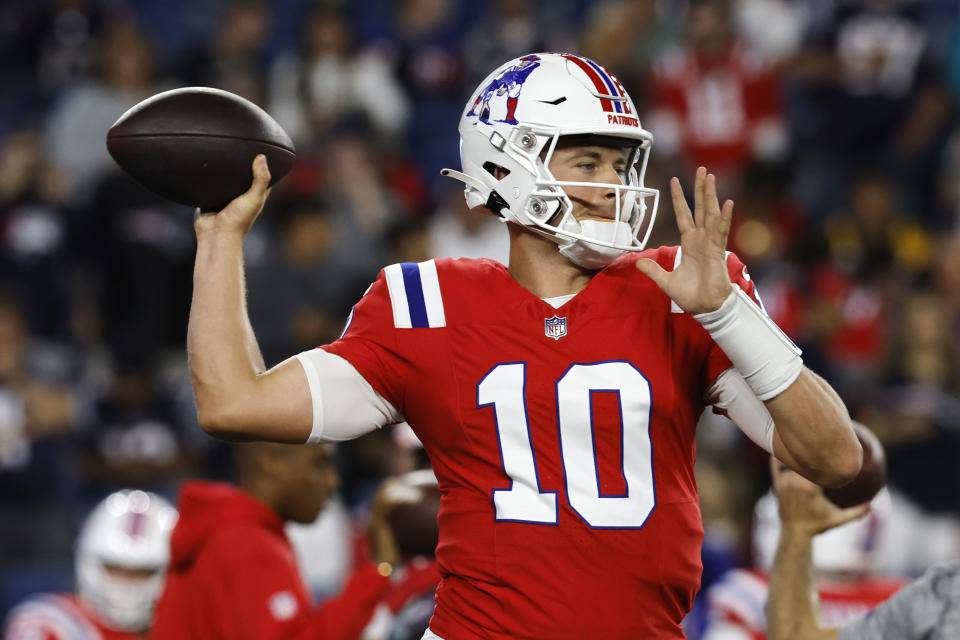 New England Patriots quarterback Mac Jones (10) warms up prior to an NFL football game against the Miami Dolphins, Sunday, Sept. 17, 2023, in Foxborough, Mass. (AP Photo/Michael Dwyer)