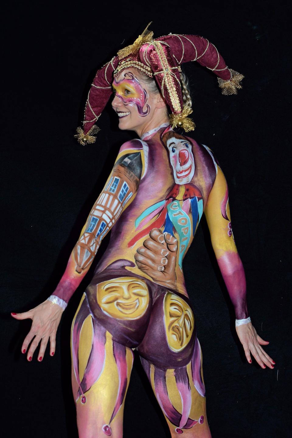 Nude models pose for world bodypainting festival