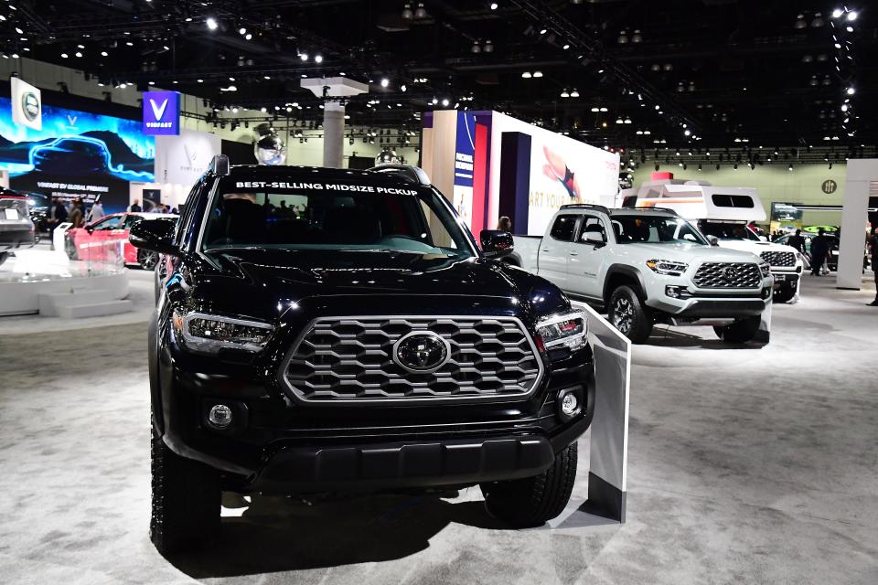 Toyota Tacoma pickup truck line up on display during the LA Auto Show at the Los Angeles Convention Center.
