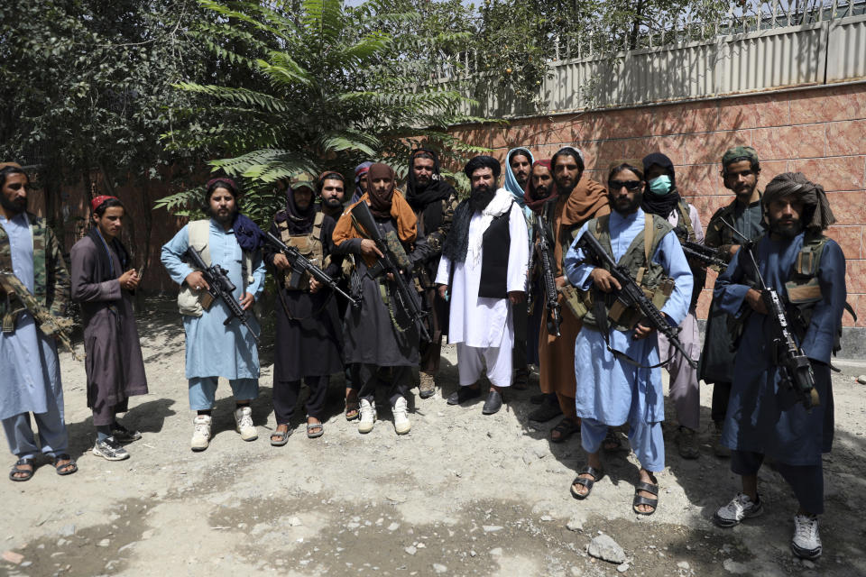 Taliban fighters pose for a photograph in the Wazir Akbar Khan neighborhood in the city of Kabul, Afghanistan, Wednesday, Aug. 18, 2021. (AP Photo/Rahmat Gul)