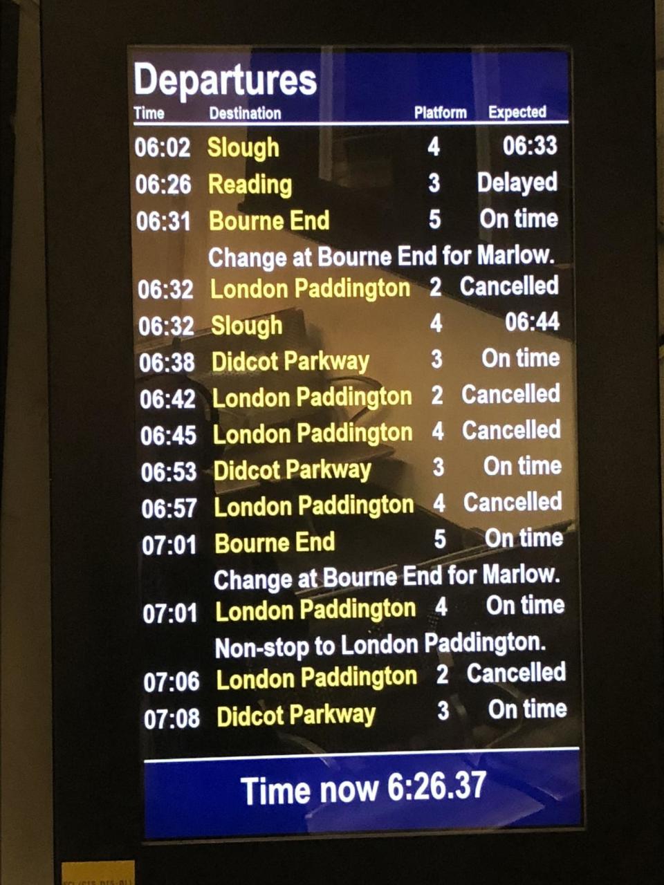 A departure board at Paddington Station in west London shows cancelled trains (PA)