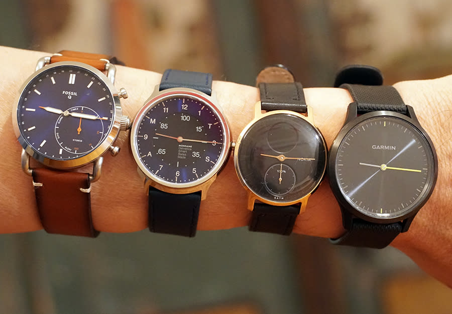 From left: Fossil Q Commuter, Mondaine Helvetica 1 Smart Watch, Nokia Steel HR, and Garmin Vivomove HR.