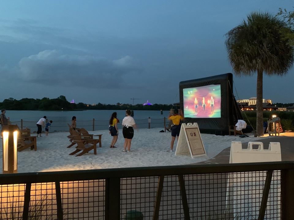 movie screen set up on a beach at Polynesian resort disney world