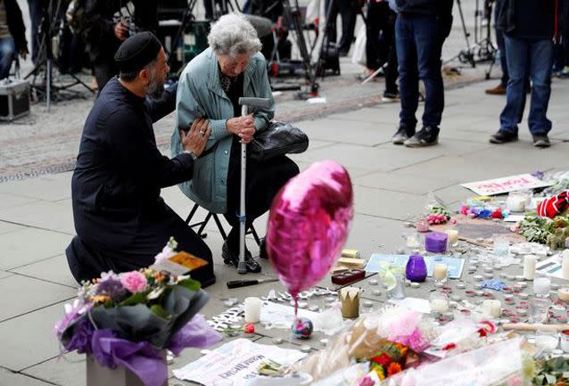 The Muslim man and Jewish woman prayed together for the victims of the Manchester bombing. Source: Reuters