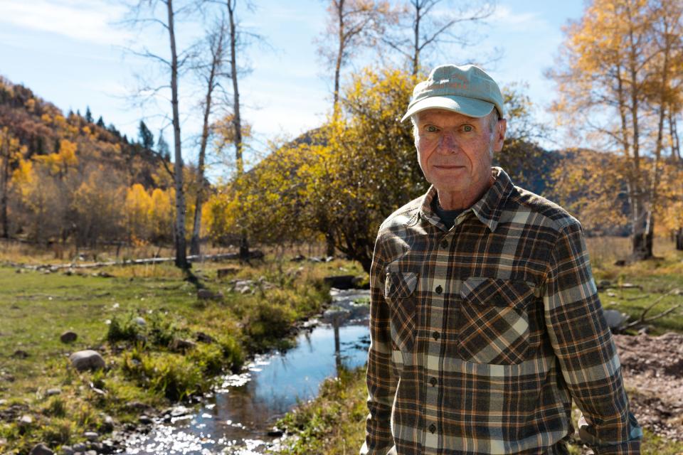 Steven Clyde stands by a flume, a humanmade channel for water, at his ranch in Kamas on Sunday, Oct. 15, 2023. | Megan Nielsen, Deseret News