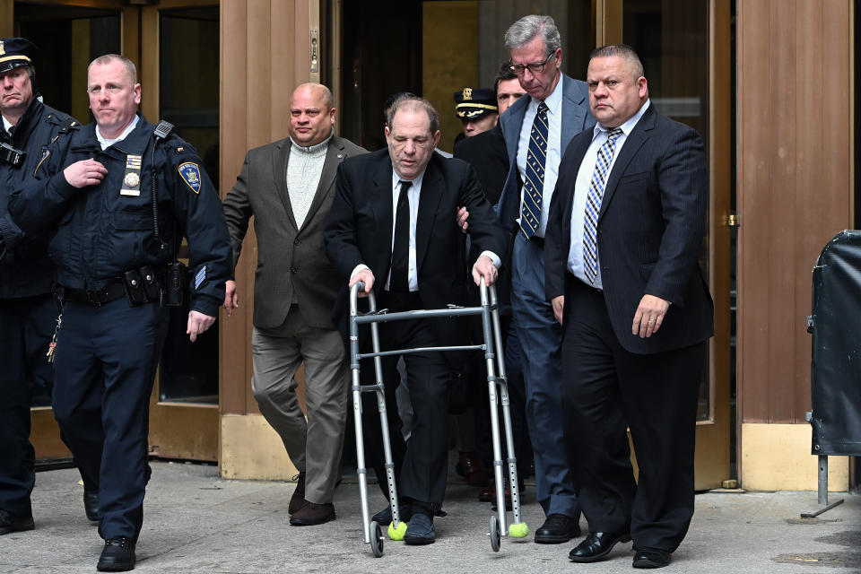 Former movie mogul Harvey Weinstein is seen leaving New York City Criminal Court with a walker. 