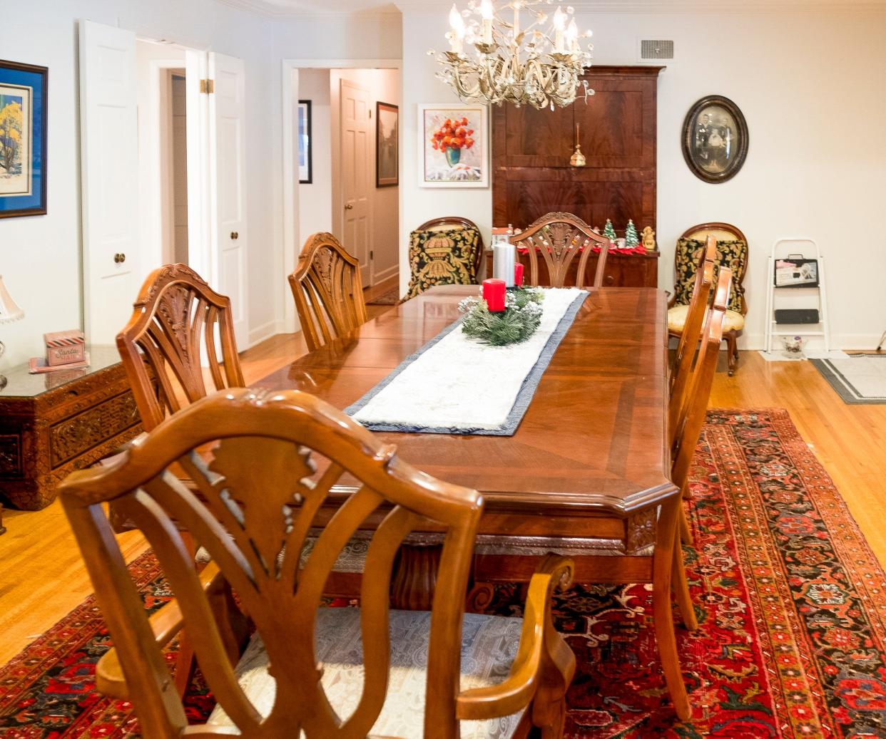 The formal dining room sits right near the home’s entrance. The room provides plenty of space for entertainment.