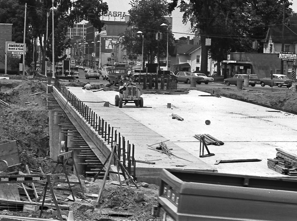 The Washington Avenue bridge takes shape in June 1967, one of several bridges to span the expressway that runs below ground level for some distance.