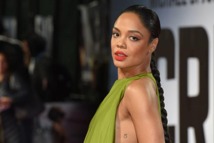 US actor Tessa Thompson poses upon arrival to attend the European Premiere of the film &quot;Creed II&quot; in London on November 28, 2018. (Photo by Anthony HARVEY / AFP) (Photo credit should read ANTHONY HARVEY/AFP via Getty Images)