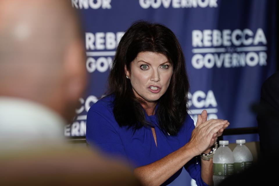 FILE - In this Wednesday, Aug. 2, 2022, photo, Wisconsin Republican gubernatorial candidate Rebecca Kleefisch participates in a round table discussion in Pewaukee, Wis. Days after saying that running negative ads is "just bad policy" and politicians who do that are "losing," the Wisconsin Republican candidate for governor backed by Donald Trump. Tim Michels, has launched his first attack ad against his primary opponent, Kleefisch. (AP Photo/Morry Gash, File)