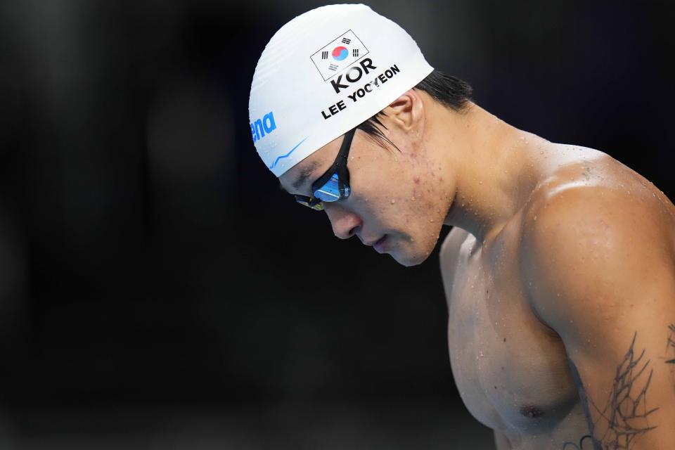 Hwang Sun-Woo of South Korea prepares prior to compete in the men's 200-meter freestyle final at the World Aquatics Championships in Doha, Qatar, Tuesday, Feb. 13, 2024. (AP Photo/Hassan Ammar)