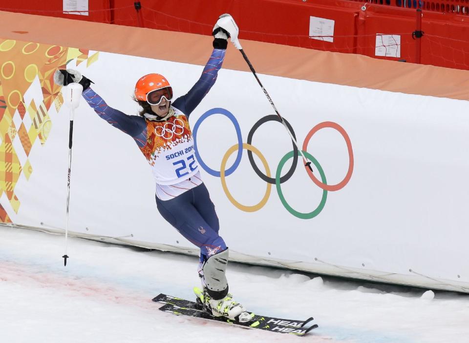 United States' Julia Mancuso celebrates as finishes the slalom portion of the women's supercombined to win the bronze medal at the Sochi 2014 Winter Olympics, Monday, Feb. 10, 2014, in Krasnaya Polyana, Russia. (AP Photo/Luca Bruno)