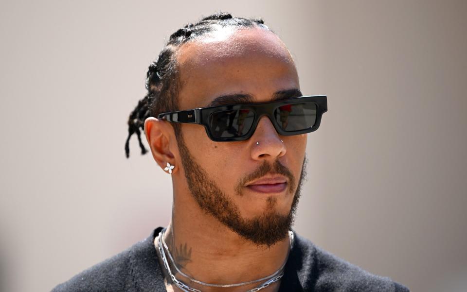 Lewis Hamilton of Great Britain and Mercedes walks in the Paddock prior to practice ahead of the F1 Grand Prix of Bahrain at Bahrain International Circuit on March 03, 2023 in Bahrain, Bahrain - Clive Mason/Getty Images