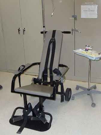 A 'restraint chair' and other equipment of the type used in force-feeding detainees is seen during a media tour of the Guantanamo Bay military prison at Guantanamo Bay U.S. Naval Base, in this picture taken April 19, 2016. REUTERS/Matt Spetalnick