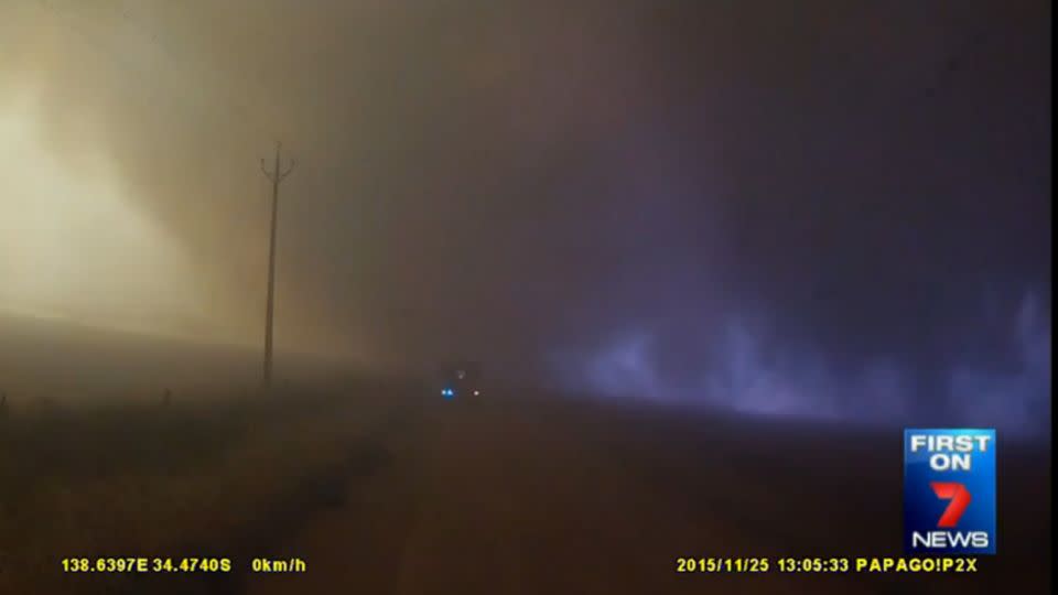 The wind changes direction and within seconds, the sky turns black. Photo: 7News