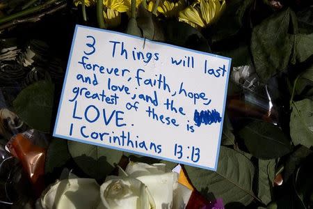 A sign of support is pictured at a makeshift memorial at Emanuel African Methodist Episcopal Church in Charleston, June 20, 2015. REUTERS/Carlo Allegri